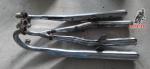 SUZUKI 380 GT  2 tiempos juego escapes Originales para restaurar consultar tlf 647527038 o  motospaniagua. com