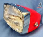 Faro ciclomotor Rinder 120. <br>Carcasa roja original de plastico. <br>Valido para varios ciclomotores de epoca. <br>Material nuev